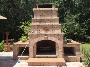 large stone outdoor fireplace