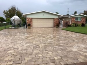 light stone residential driveway when wet